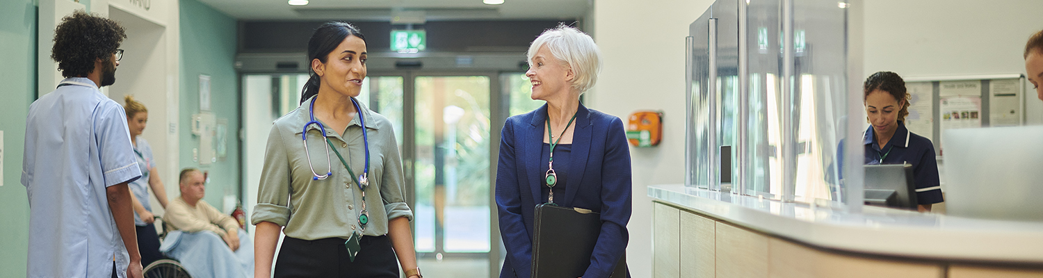 doctors talking to each in office