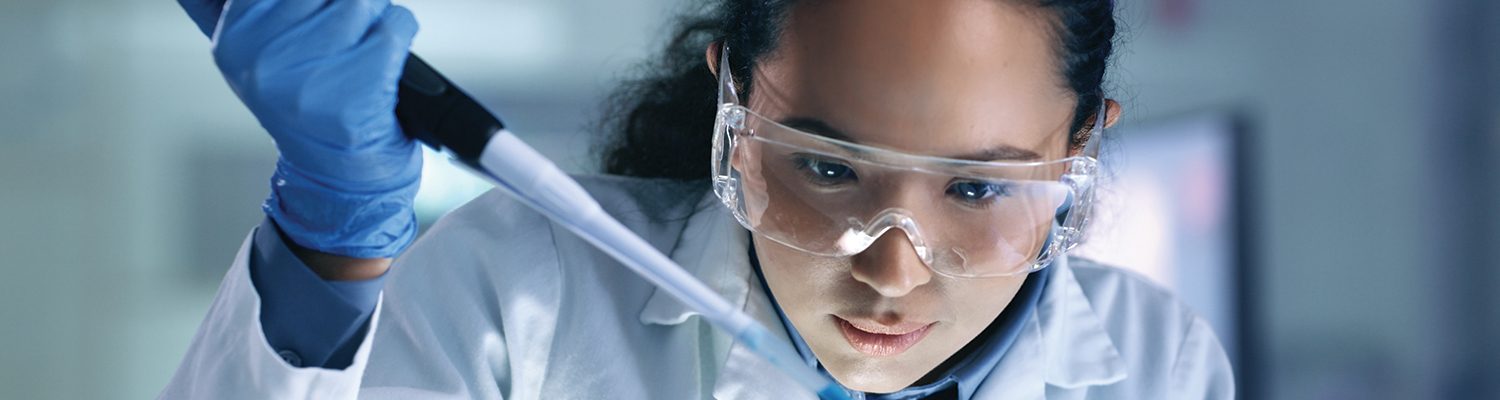 researcher with dropper